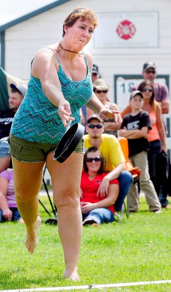 Anissa Chase, 42, of Whitefield, competes in the Ladies Fry Pan Throwing Contest today at the Windsor Fair.