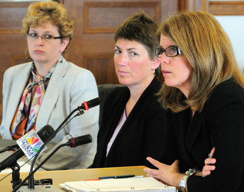 Jody Breton, Associate Commissioner, Department of Corrections, left, Mary Louise McEwen, Superintendent of Riverview Psychiatric Center, and Mary Mayhew, commissioner of the Department of Health and Human Services, testifies during a Appropriations Committee hearing on Thursday at the State House in Augusta.