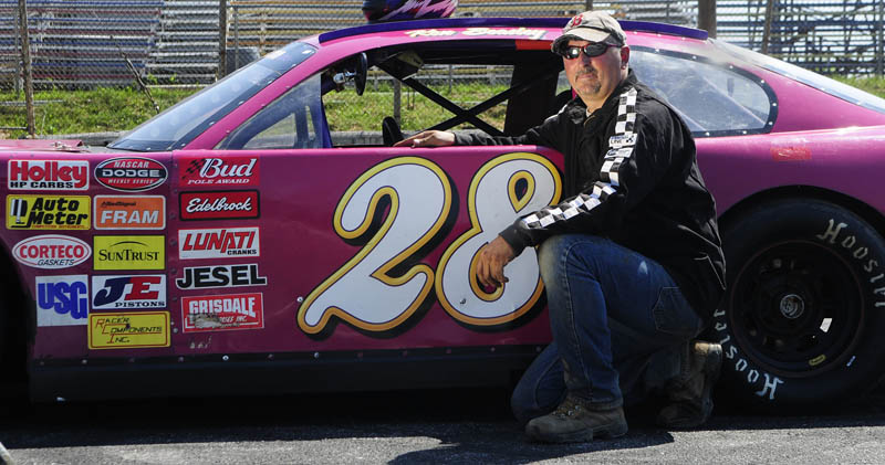 READY TO WIN: Ken Beasley of Richmond poses with his No. 28 Chevy Impala Pro Stock car Wednesday afternoon at Wiscasset Speedway. Beasley is looking for his first feature win in the division.