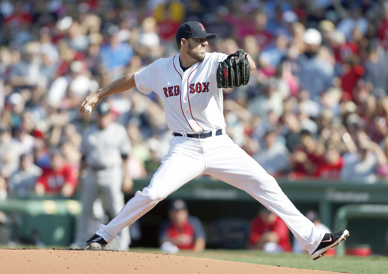 GETTING IT DONE: Boston starting pitcher John Lackey allowed one run on six hits in 62⁄3 innings as the Red Sox beat the Yankees 6-1 on Saturday at Fenway Park in Boston.