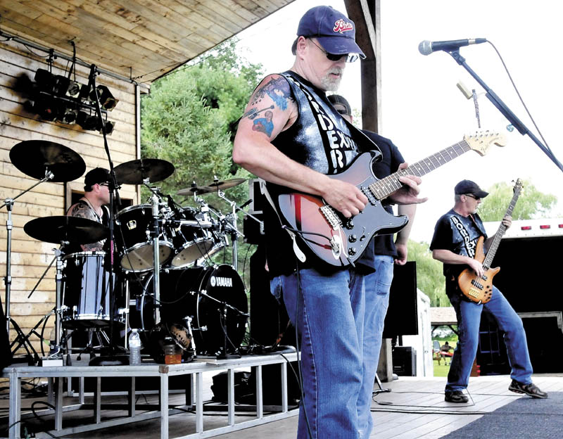 Borderline Express performs during theA Day in the Park for the Arts fundraiser on Sunday, set up to benefit Winslow High School's performing arts programs.