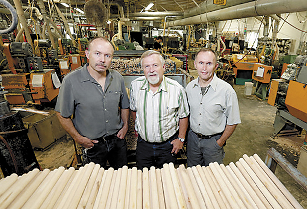Owners and brothers Jody Fletcher, left, Doug Fletcher, center, and Gary Fletcher of Maine Wood Products inside company's New Vineyard mill.
