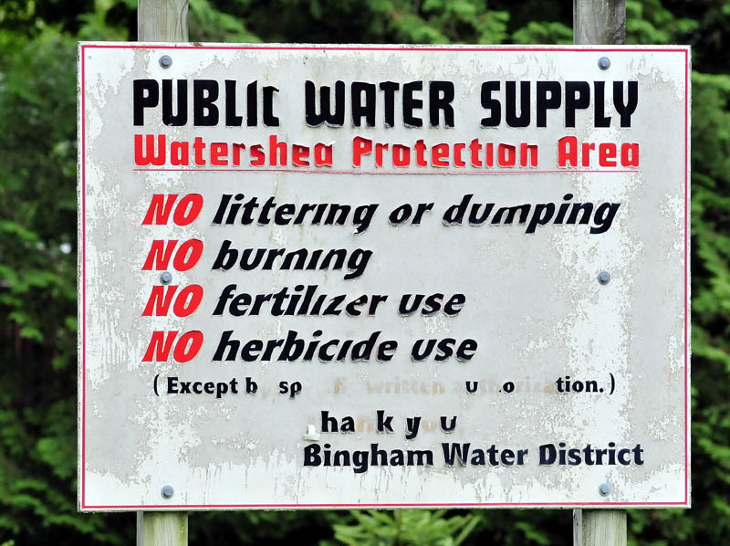 A sign in Bingham limits certain activities that could be detrimental to the town's water supply.