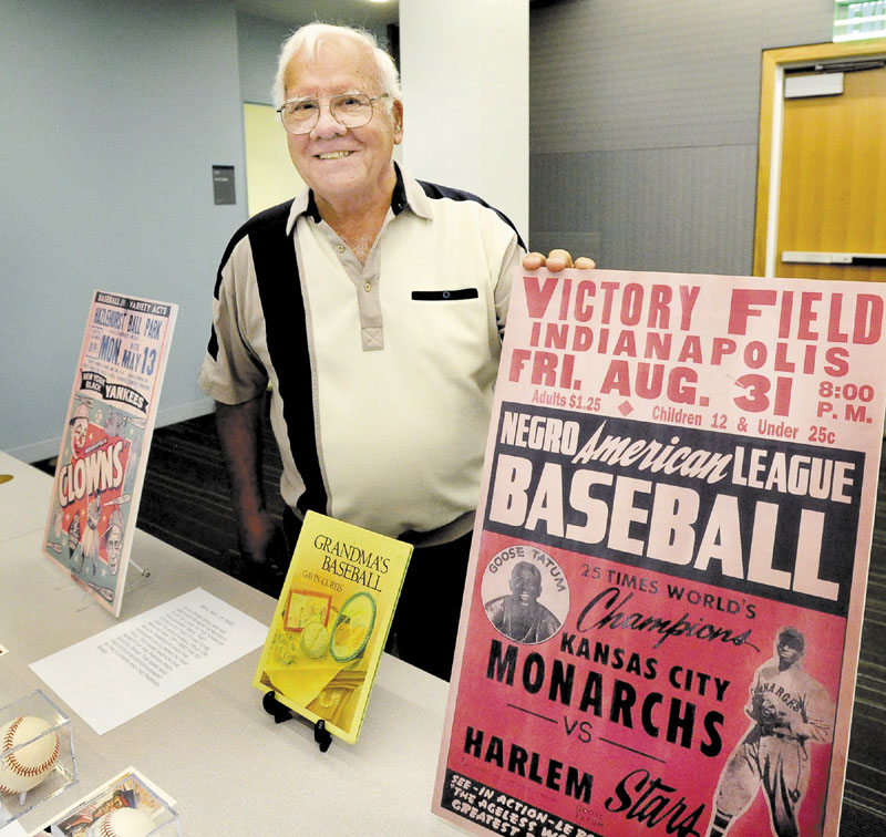 SHARING HIS KNOWLEDGE: Joe Caliro lectures and displays baseball memorabilia of the Negro Leagues at the Portland Public Library. Caliro developed his passion for the Negro Leagues when he was in the military stationed in Biloxi, Miss.