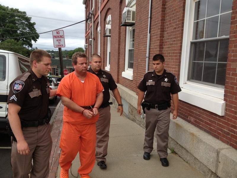 Waldo County sheriff's deputies lead Todd Gilday into Waldo County Superior Court in Belfast on Thursday. Gilday has been charged with murder in the shooting death of Lynn Arsenault in Belfast on Wednesday.