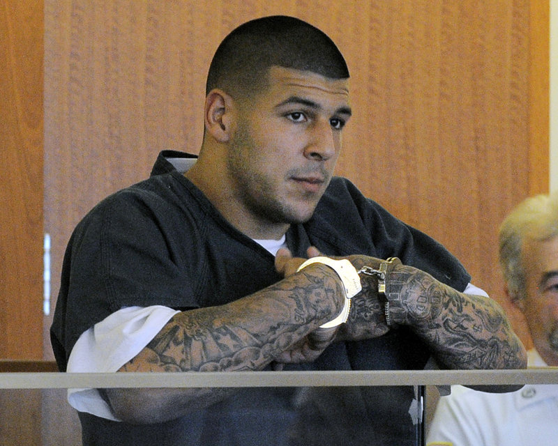 Former New England Patriots tight end Aaron Hernandez stands during a bail hearing in Fall River Superior Court in Fall River, Mass., on June 27.