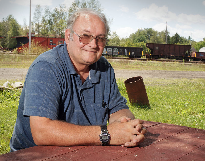 Stephen Dean, pastor at the United Methodist Church, lives next to the rail yard at Brownville Junction in Brownville, which he says was a “hopping place” when he was a boy growing up here.
