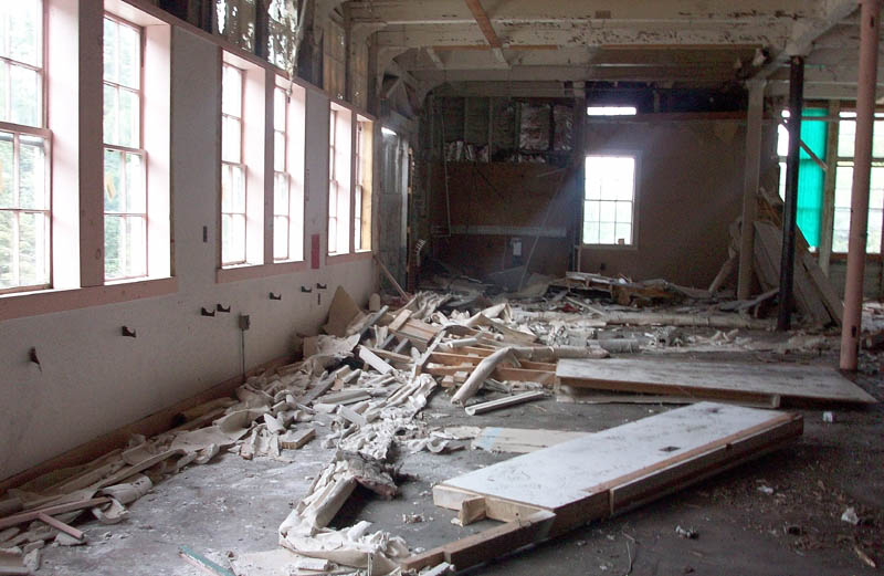 Asbestos-laden debris is seen inside the former Forster Mill in Wilton in 2011.
