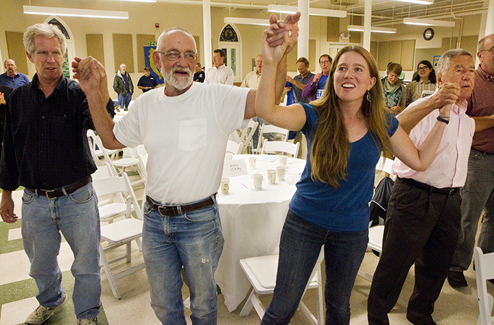 Some of the 150 people at the Southern Maine Labor Council's Labor Day Breakfast sing "Solidarity Forever" at the Maine Irish Heritage Center in Portland on Monday, September 2, 2013. They are, from left, Ned McCann of Portland, Peter Kellman of North Berwick, Sarah Bigney, AFLCIO staff member from Hallowell, and Charles Scontras of Cape Elizabeth.