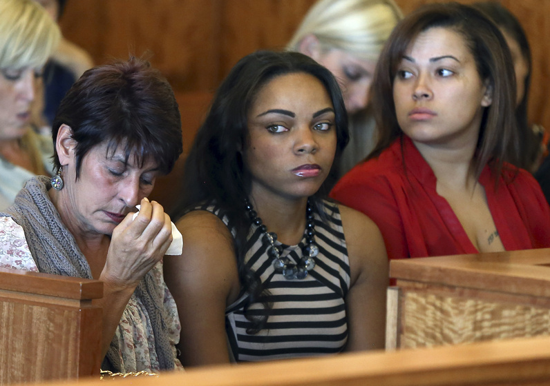 The girlfriend of former New England Patriots player Aaron Hernandez, Shayanna Jenkins, center, is shown at a court hearing for Hernandez earlier this month in Fall River, Mass.