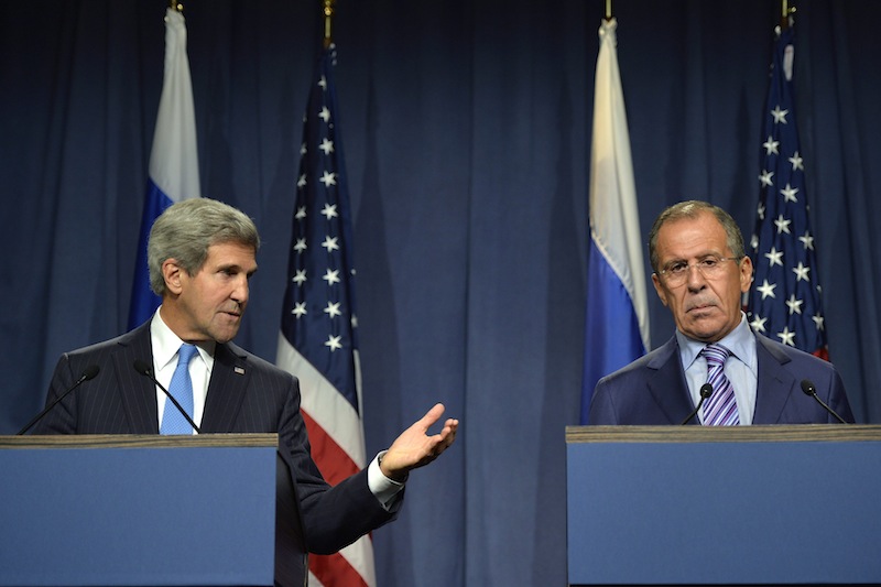 U.S. Secretary of State John Kerry speaks next to Russian Foreign Minister Sergey Lavrov, right, during a press conference before their meeting to discuss the ongoing crisis in Syria, in Geneva, Switzerland, Thursday Sept. 12, 2013. Secretary of State John Kerry and his team have opened two days of meetings with their Russian counterparts in Geneva. Kerry is hoping to come away with the outlines of a plan for securing and destroying vast stockpiles of Syrian chemical weapons. (AP Photo/Keystone, Martial Trezzini)