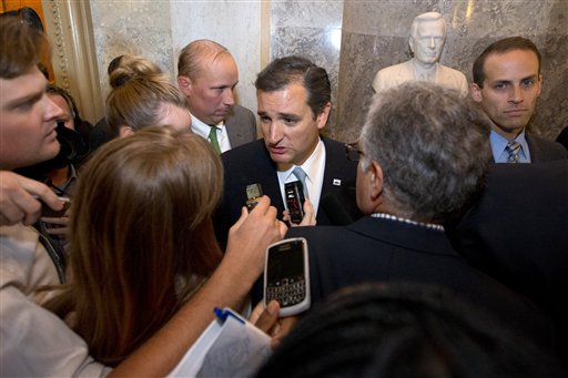 Sen. Ted Cruz, R-Texas, speaks to reporters on Capitol Hill Wednesday after ending his marathon speech on the Senate floor.