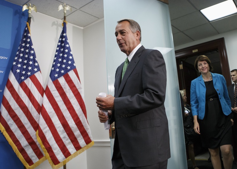 House Speaker John Boehner Ohio, followed by Rep. Cathy McMorris Rodgers, R-Wash., the Republican Conference chair, arrives to meet with reporters on Capitol Hill in Washington, Thursday, Sept. 26, 2013, after a closed-door strategy session. Pressure is building on fractious Republicans over legislation to prevent a partial government shutdown, as the Democratic-led Senate is expected to strip a tea party-backed plan to defund the Affordable Care Act, popularly known as "Obamacare," from their bill. (AP Photo/J. Scott Applewhite)