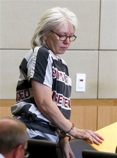 Debra Milke listens to a judge during an Aug. 1 hearing at Maricopa County Superior Court in Phoenix. She was released Friday and is awaiting a retrial in the 1989 shooting death of her 4-year-old son, Christopher,