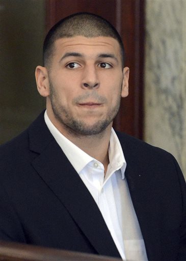 Former New England Patriots player Aaron Hernandez appears during a brief hearing in district court in Attleboro, Mass., on Aug. 30, 2013.