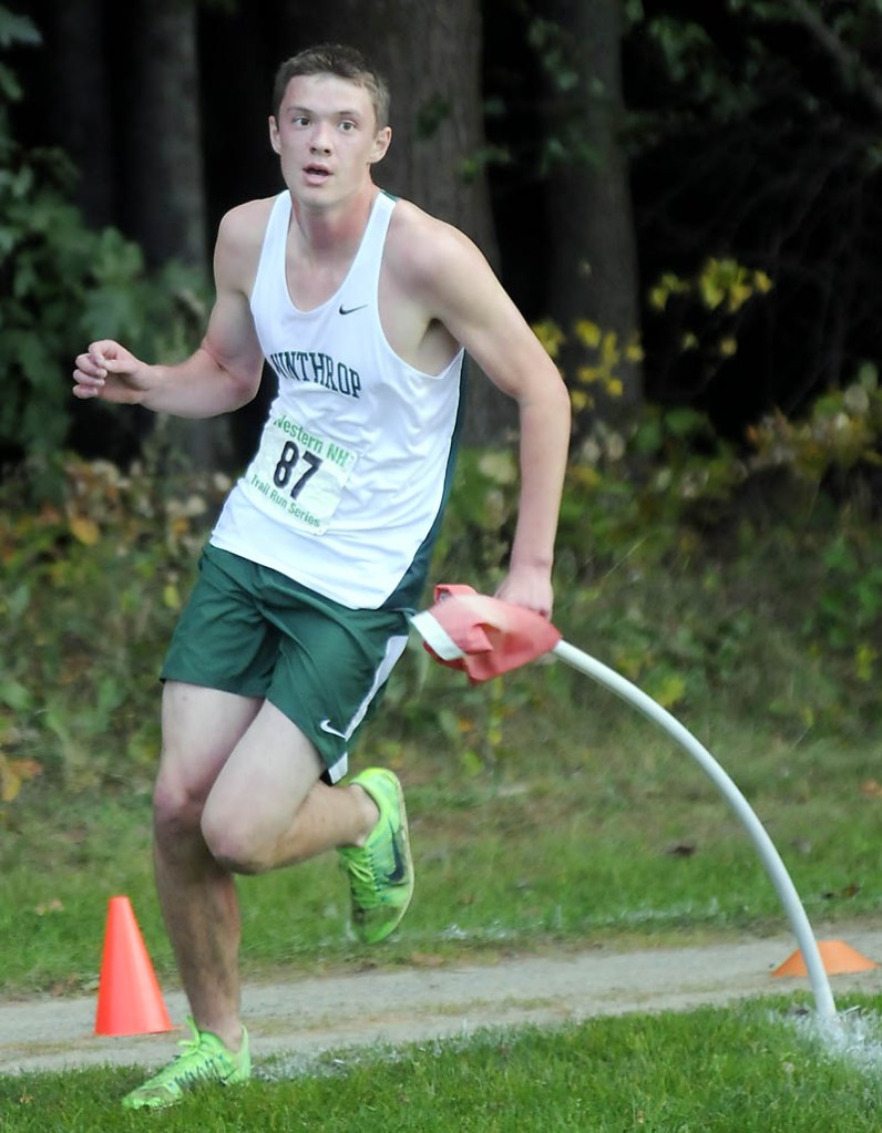 FINISHING KICK: Winthrop High School’s Ben Allen runs to the finish line during a cross country meet Wednesday at the University of Maine at Augusta. Allen finished second.