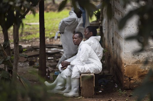 A morgue worker waits outside in the grounds of the mortuary in Nairobi, Kenya, on Wednesday. On Friday, Karen Wambui identified her son as the last person to be confirmed killed during the Sept. 21, al-Shabab terrorist assault on the Westgate Mall in Nairobi, Kenya.