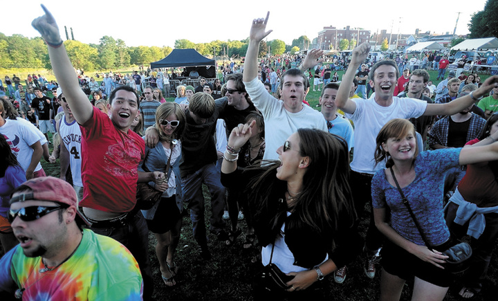 Fans dance to the musical styling of Rustic Overtones at a past Hill 'n the Ville Music Festival at the Head of Falls on Front Street in Downtown Waterville.