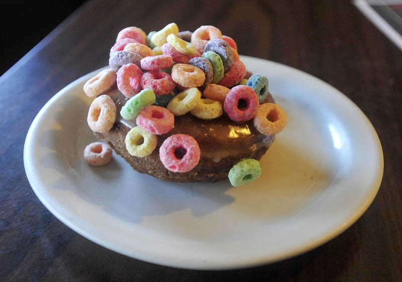 The Cereal Killer doughnut, one of 116 different types of doughnuts offered at Ann and John Maglaras' Kennebec Cafe on Main Street in Fairfield.