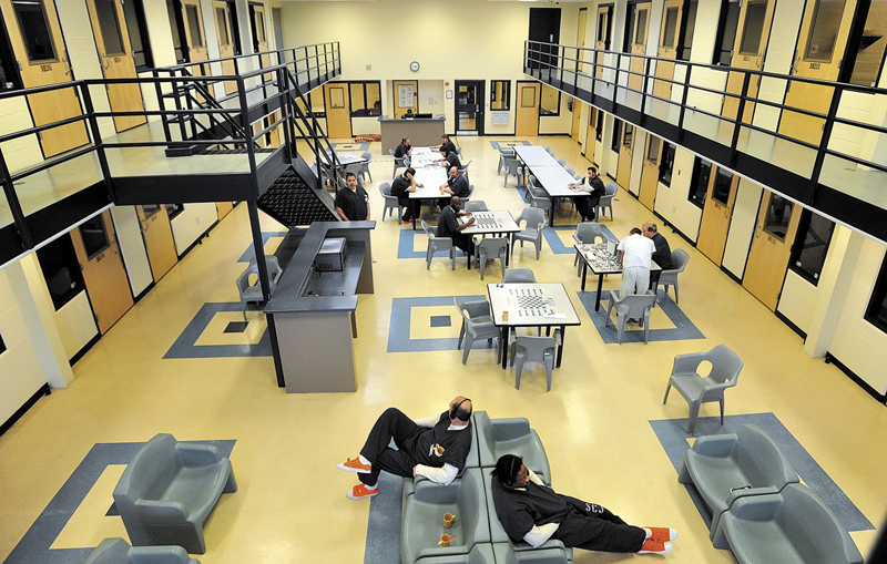Inmates read and play board games in the day room in the medium security wing at the Somerset County Jail in East Madison in Feburary. Somerset County officials say they were omitted from the jails panel as punishment.