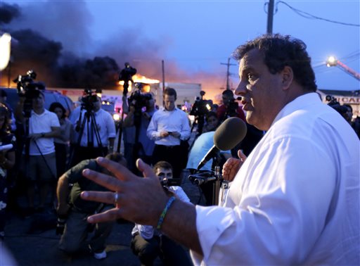 New Jersey Gov. Chris Christie addresses the media near the area hit by a massive fire on Thursday in Seaside Park, N.J.