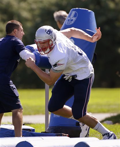 New England Patriots tight end Rob Gronkowski (87) pushes off a block during practice at the NFL football team's facility in Foxborough, Mass., Wednesday Sept. 4, 2013. The Patriots open their regular season against the Buffalo Bills on Sunday. (AP Photo/Stephan Savoia) Gillette Stadium