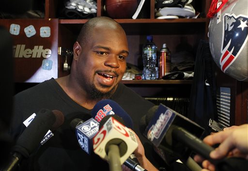 New England Patriots defensive tackle Vince Wilfork speaks with the media in the locker room at Gillette Stadium in Foxborough, Mass., Tuesday, Sept. 10, 2013. The Patriots play the New York Jets on Thursday in Foxborough. (AP Photo/Stew Milne)