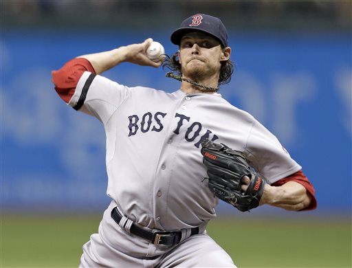 Boston Red Sox starting pitcher Clay Buchholz delivers to Tampa Bay Rays' David DeJesus during the first inning of a baseball game Tuesday, Sept. 10, 2013, in St. Petersburg, Fla. (AP Photo/Chris O'Meara) Tropicana Field