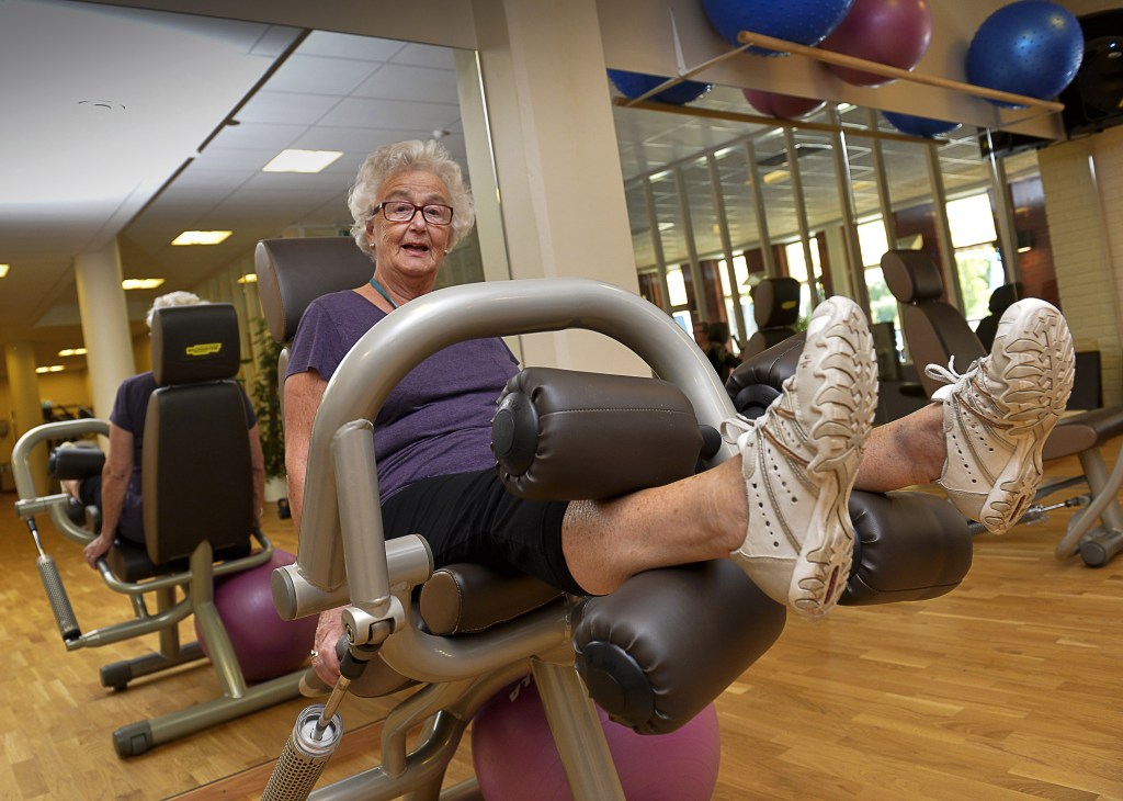 80-year-old Marianne Blomberg works out at a gym in Stockholm. The Swedish government has suggested people continue working beyond 65, a prospect Blomberg cautiously welcomes but warns should not be a requirement.