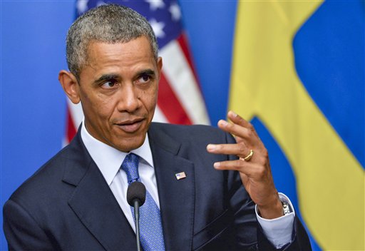 U.S. President Barack Obama fields questions during a press conference with the Swedish prime minister at the chancellery Rosenbad in Stockholm, Sweden, on Wednesday.