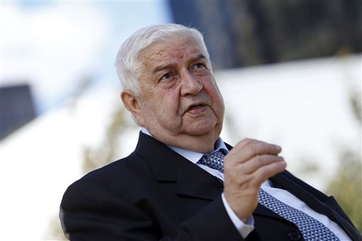 Syrian Foreign Minister Walid al-Moallem gives an interview during the 68th session of the United Nations General Assembly at U.N. headquarters on Saturday.