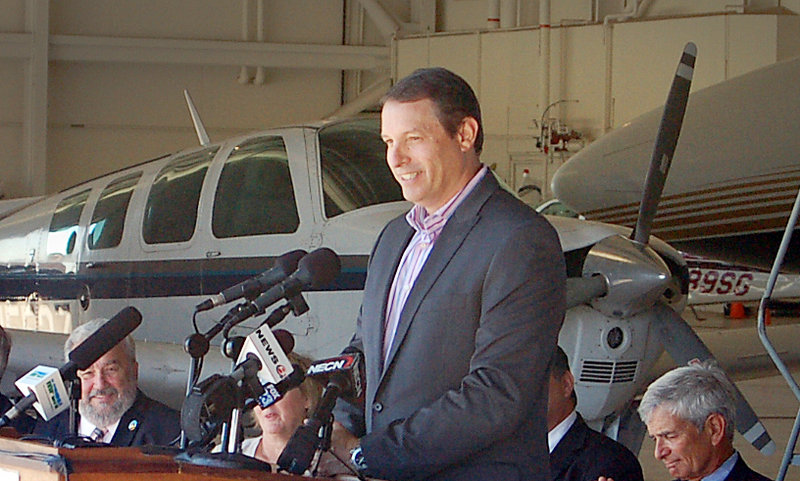 Tempus Jets CEO Scott Terry speaks at a press conference at the former Brunswick Naval air station on Wednesday, Sept. 4, 2013, where Tempus will relocate part of its business.