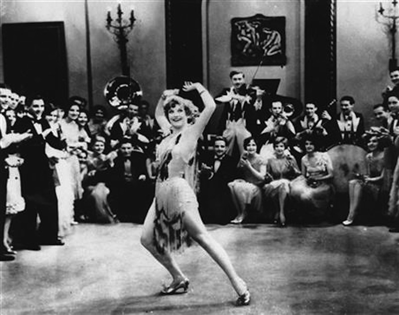 In this 1928 file photo, Actress Joan Crawford is seen dancing the Charleston in "Our Dancing Daughters" in Hollywood, Calif. A report released, September, 10, 2013, shows that the very wealthiest Americans earned more than 19 percent of the country’s household income in 2012, their biggest share since 1928. And the top 10 percent captured a record 48.2 percent of total earnings last year. (AP Photo/File)