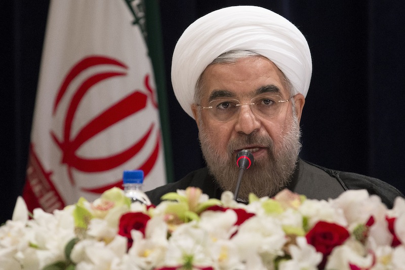 Iranian President Hassan Rouhani speaks during a news conference at the Millennium Hotel in midtown Manhattan, Friday, Sept. 27, 2013, in New York. (AP Photo/John Minchillo)