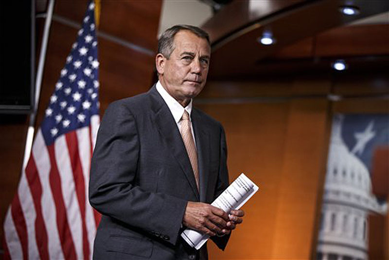 Speaker of the House John Boehner, R-Ohio, arrives for a news conference at the Capitol in Washington on Thursday.