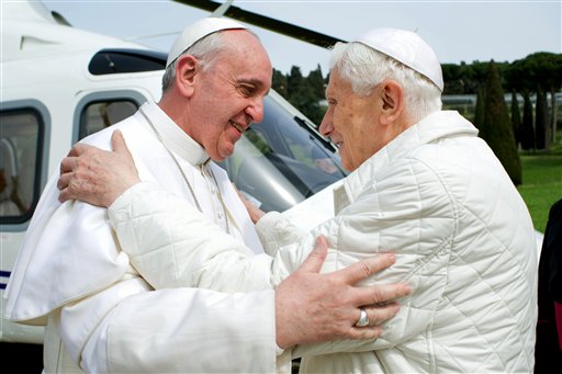 In this March 23, 2013, photo provided by the Vatican paper L'Osservatore Romano, Pope Francis, left, meets Pope emeritus Benedict XVI in Castel Gandolfo.