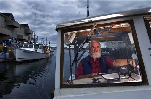Casco Bay waterkeeper Joe Payne pilots his vessel in Portland on Wednesday. When Payne was hired 22 years ago to be the environmental steward of Casco Bay, there were only a handful of water keepers in the world. Now, there are 209 of them that oversee and protect bays, rivers, sounds, channels, inlets, lakes and creeks in 23 countries, on six continents.