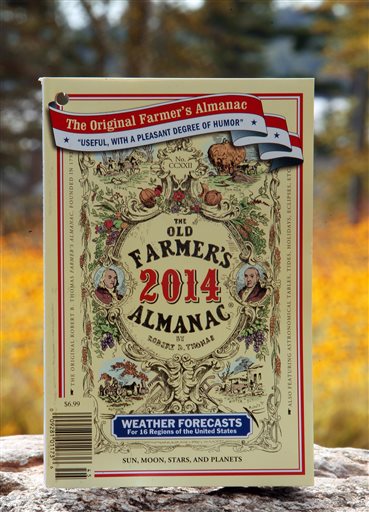 The 2014 edition of the Old Farmer's Almanac sits on a stone wall in New London, N.H., Monday, Sept. 9, 2013. Believed to be the oldest continuously published periodical in North America, the 222 edition is predicting that a drop in solar activity and a change in ocean patterns point to colder-than-average temperatures and higher-than-average snowfall totals in the United States. (AP Photo/Jim Cole)