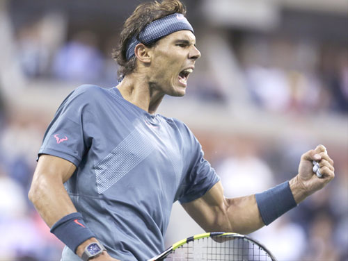 CHAMP: Rafael Nadal reacts after a point against Novak Djokovic during the men’s singles final of the U.S. Open on Monday in New York. Nadal won 6-2, 3-6, 6-4, 6-1 for his 13th Grand Slam title.