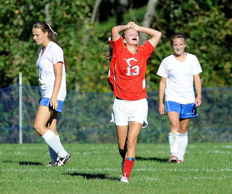ALL RIGHT: Cony High School’s Anna Brannigan, center, celebrates a goal during the Rams’ 7-3 win over Messalonskee on Thursday at Messalonskee High School in Oakland.