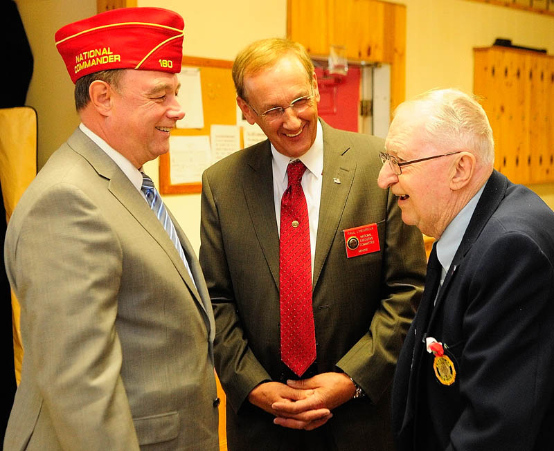 American Legion National Commander Daniel Dellinger, left, Paul L'Heureux, an American Legion National Executive Committee Member for Maine, and local American Legion member Donald Best, of Winthrop, chat on Saturday at the Alfred Maxwell Jr. Post 40 in Winthrop.