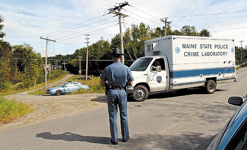 State police technicians pull into the Rice Rips Hydroelectric Project in Oakland on Sept. 17, 2003, where Colby College senior Dawn Rossignol's body was found. jim evans photo Published: No Published Caption