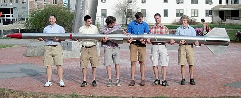 Team Ursa with the rocket they plan to send about 35 miles into the atomosphere. From left to right are Josh Mueller, of Cannon Falls, Ryan Means, of York, Luke Saindon, of Deer Isle, Alex Morrow, of Washburn, Robert Miller, of Portland and Gerard Desjardins, of Mapleton, Winslow resident Michael Ostromecky is not pictured.