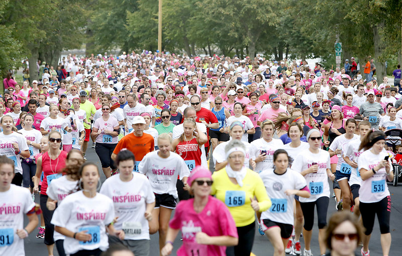 Susan G. Komen Maine Race for the Cure participants start off from Payson Park in Portland on Sunday. Many run or walk the route in honor of loved ones.