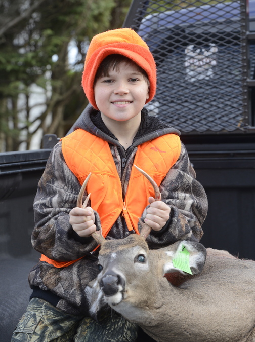 Jordan Day, 10, from Westbrook bagged this small buck with his stepfather, James Tucker, on Youth Deer Hunting Day on Saturday.