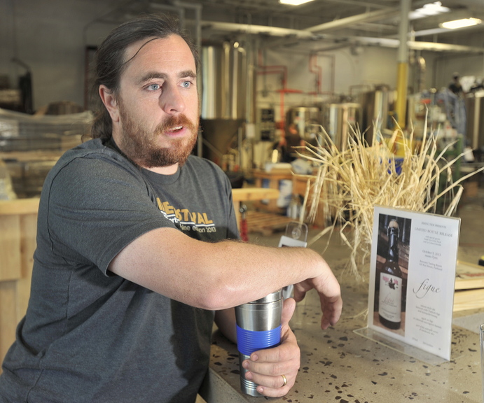 Nathan Sanborn, co-owner of Rising Tide Brewery in Portland, says the budget stalemate may slow federal approval of some of his new beer labels and delay sales.