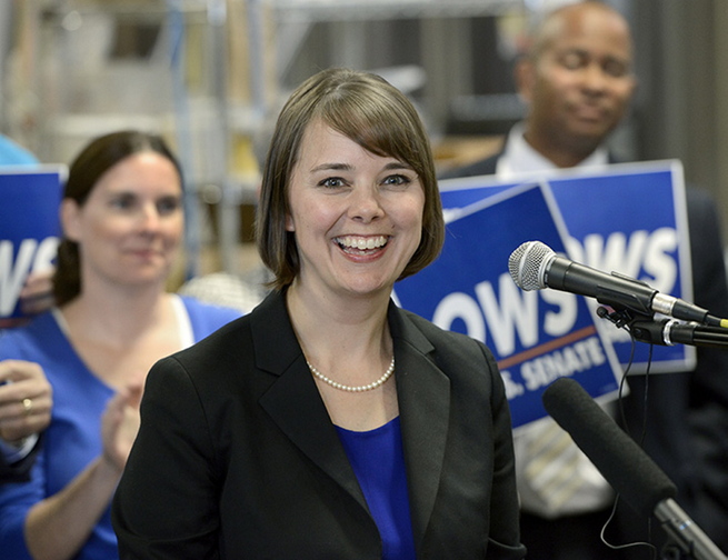 Shenna Bellows is all smiles as she launches her campaign to challenge Sen. Susan Collins with a press conference at Rising Tide Brewery in Portland on Wednesday.