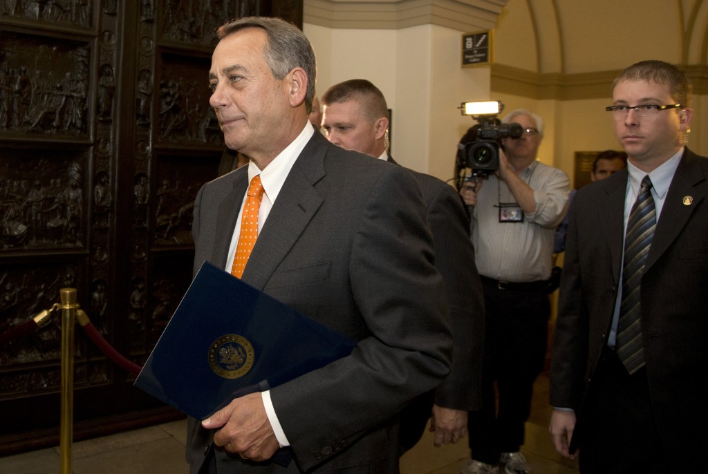 House Speaker John Boehner of Ohio arrives on Capitol Hill, Wednesday, Oct. 16, 2013, in Washington. Chaos among Republicans in the House of Representatives has left it to bipartisan leaders in the Senate to craft a last-minute deal to fend off a looming U.S. default and to reopen the federal government as a partial shutdown entered its 16th day.