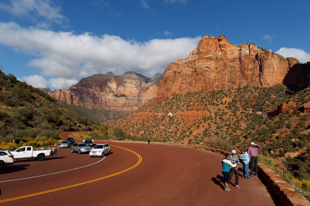 Visitors to Zion National Park take in the sights after the park opened on a limited basis Friday, Oct. 11, 2013 near Springdale, Utah. Earlier Thursday, the Obama administration said it would allow states to use their own money to reopen some national parks after a handful of governors made the request. Utah Gov. Gary Herbert said Thursday he reached an agreement to pay $166,000 a day to the Interior Department to open Utah’s five national parks, while Arizona Gov. Jan Brewer says she’d consider paying for a partial reopening of Grand Canyon National Park.