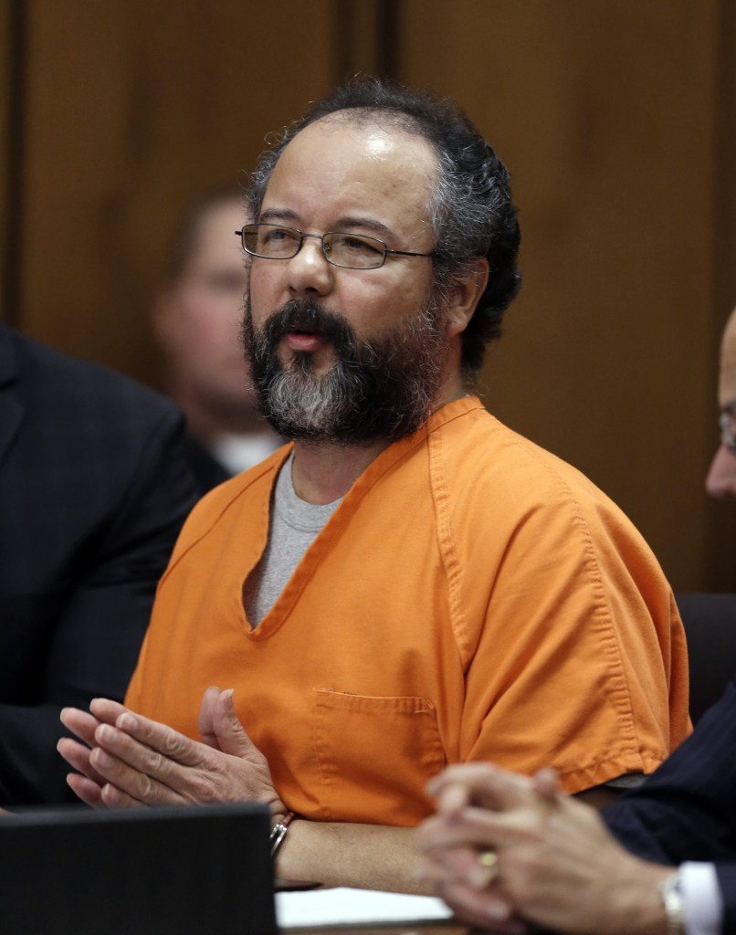 Ariel Castro makes a statement in the courtroom on Aug. 1 during his sentencing for kidnapping three women in Cleveland. A report from the Ohio Department of Rehabilitation and Correction said two prison guards falsified logs documenting their observation of Castro in the hours before he hanged himself in his cell Sept. 3 at a prison reception center south of Columbus.